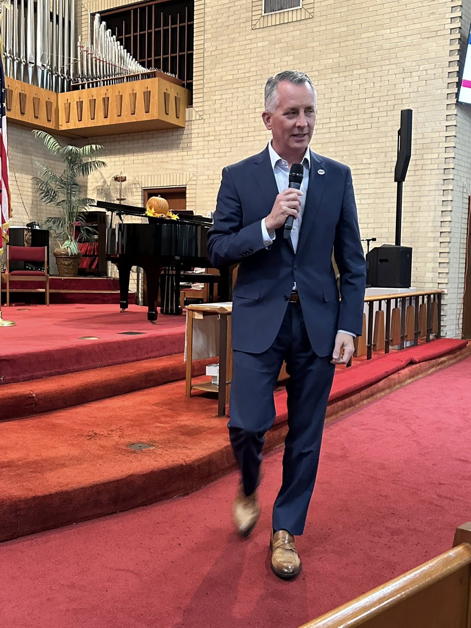 David Jolly on stage at the town hall