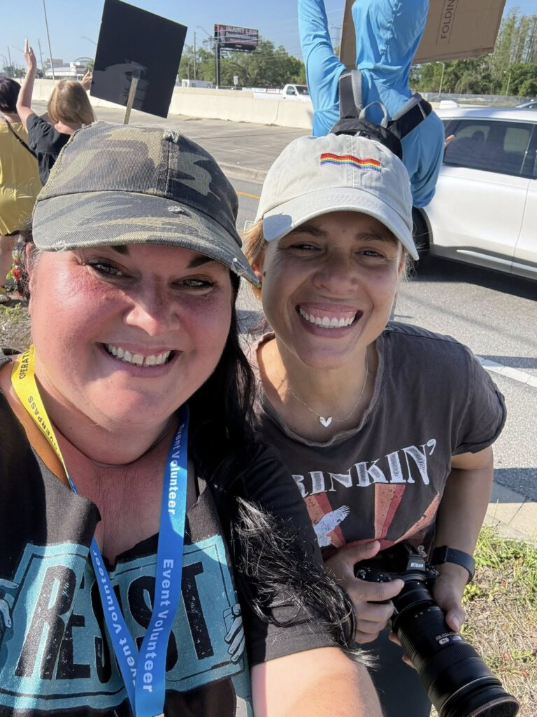 Two women showing up to show they care at the No Kings 3 rally in Pinellas County FL