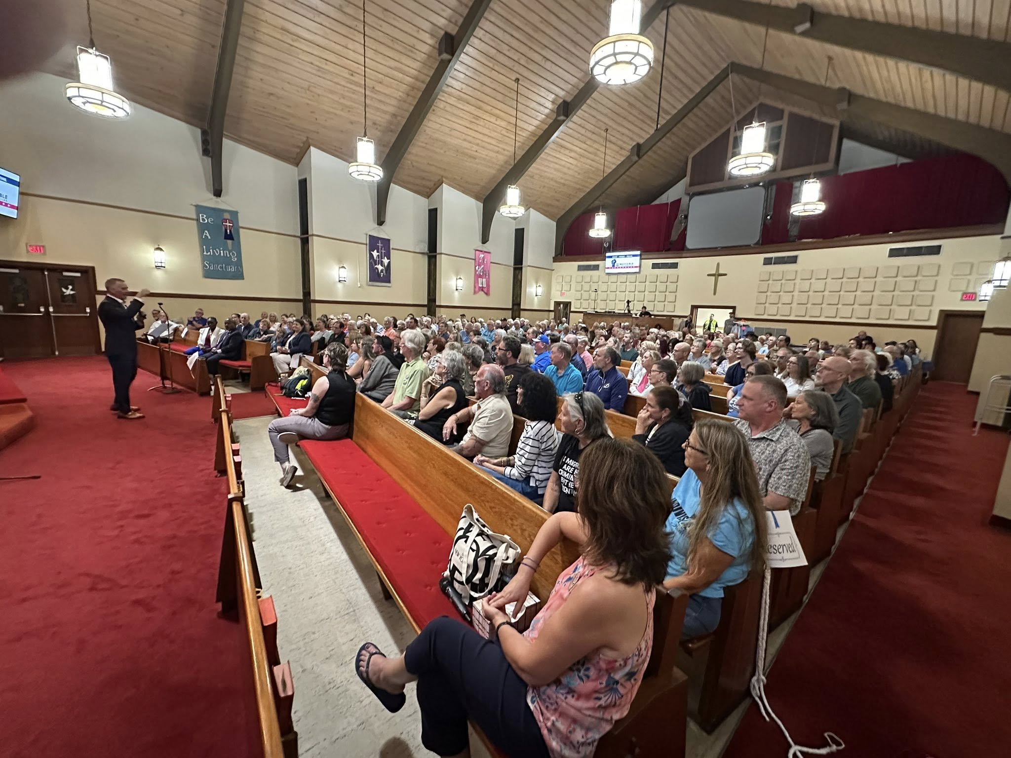 Wide view of attendees getting seated for the David Jolly Town Hall
