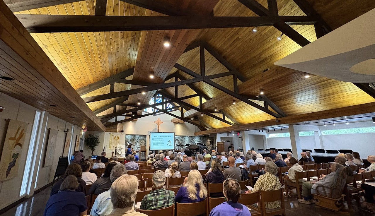 Community members filling St. Mark Lutheran Church for a Know Your Rights training in Dunedin, Florida