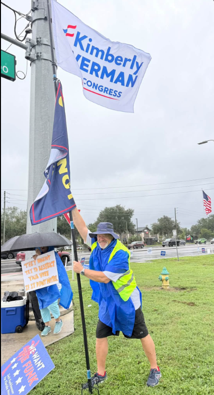 Kimberly Overman for Congress sign waving in the wind